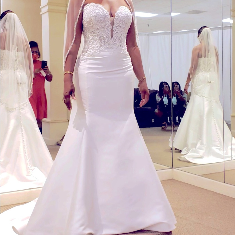 Elegant,  Maggie Sottero wedding gown.